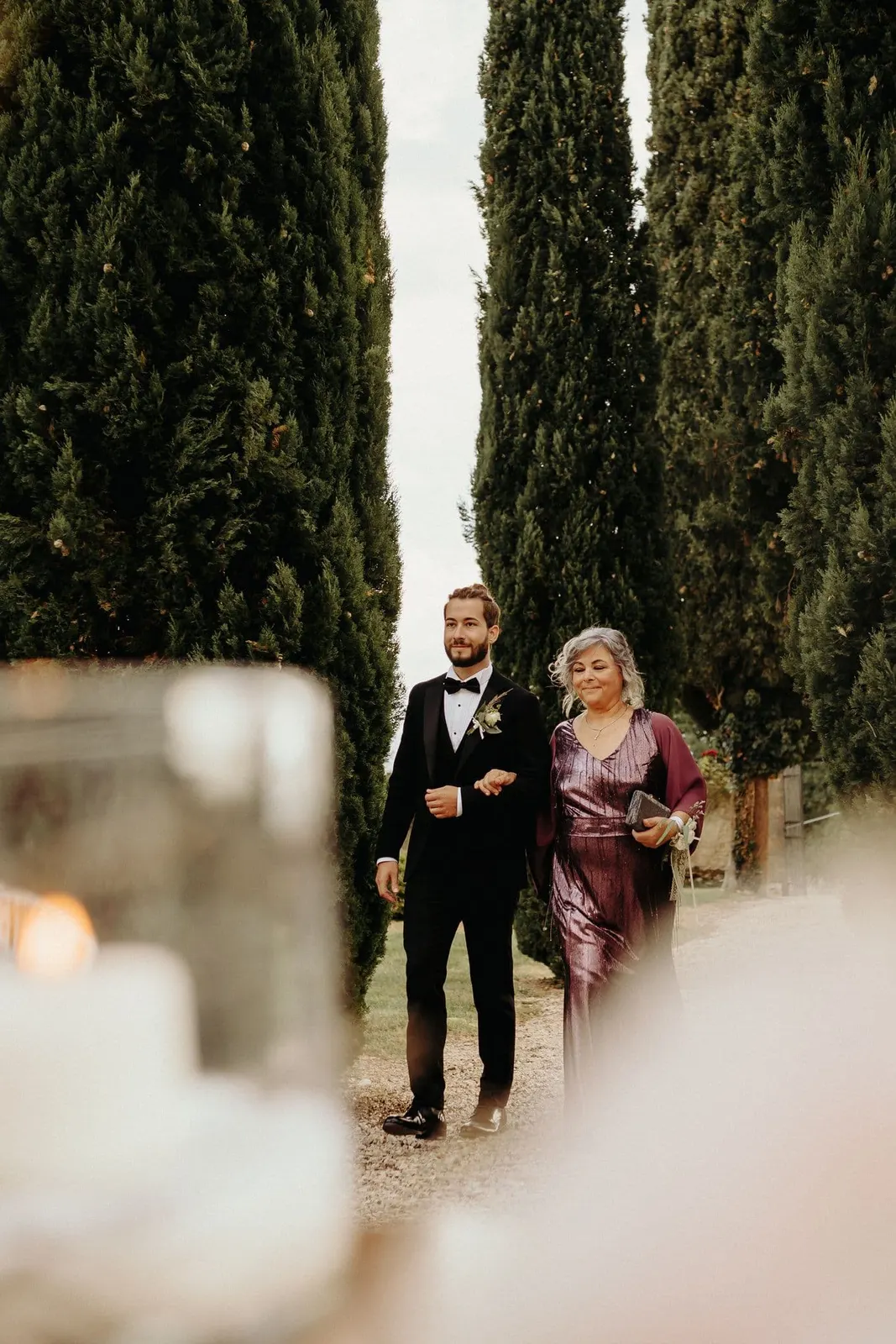 Raffaele arriving at the ceremony on his mother's arm