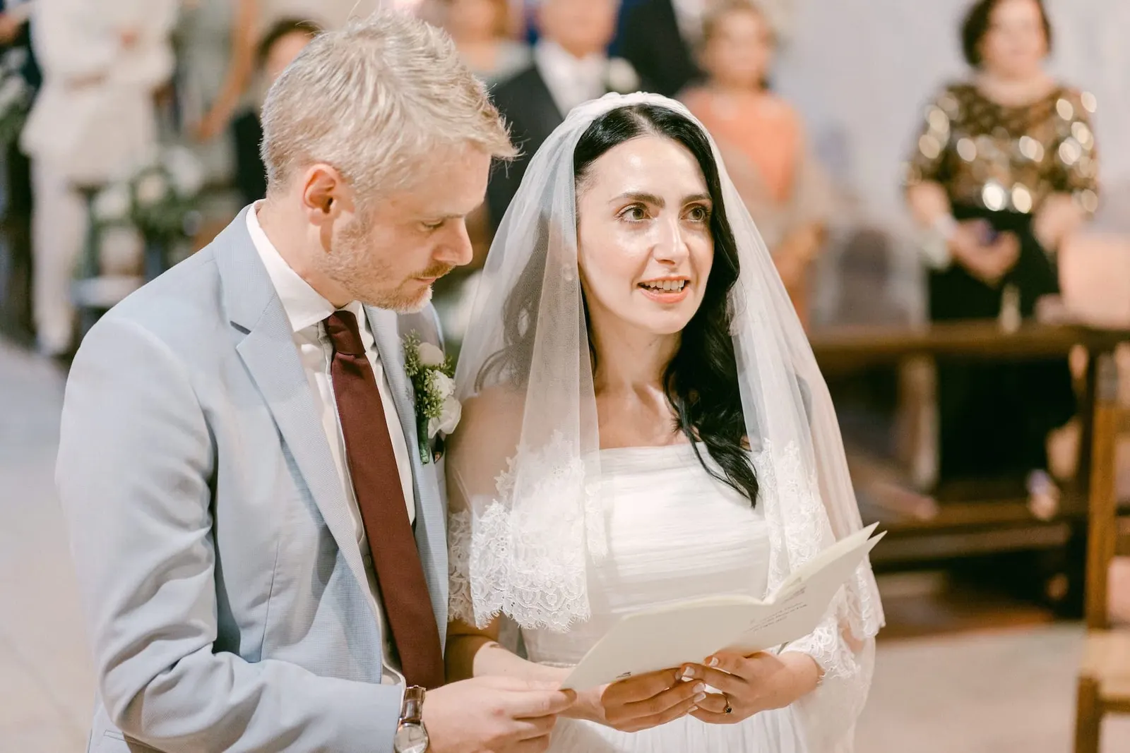 The couple reading the order of service together
