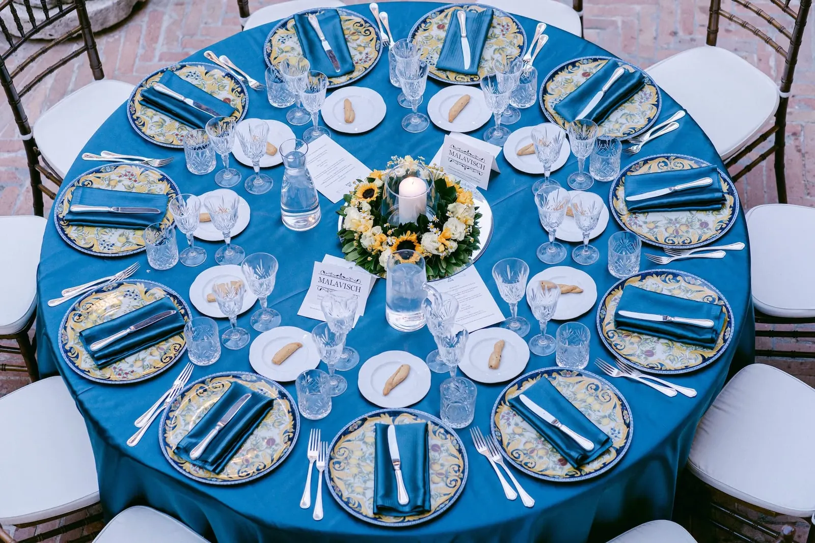 A round table dressed in blue, seen from above