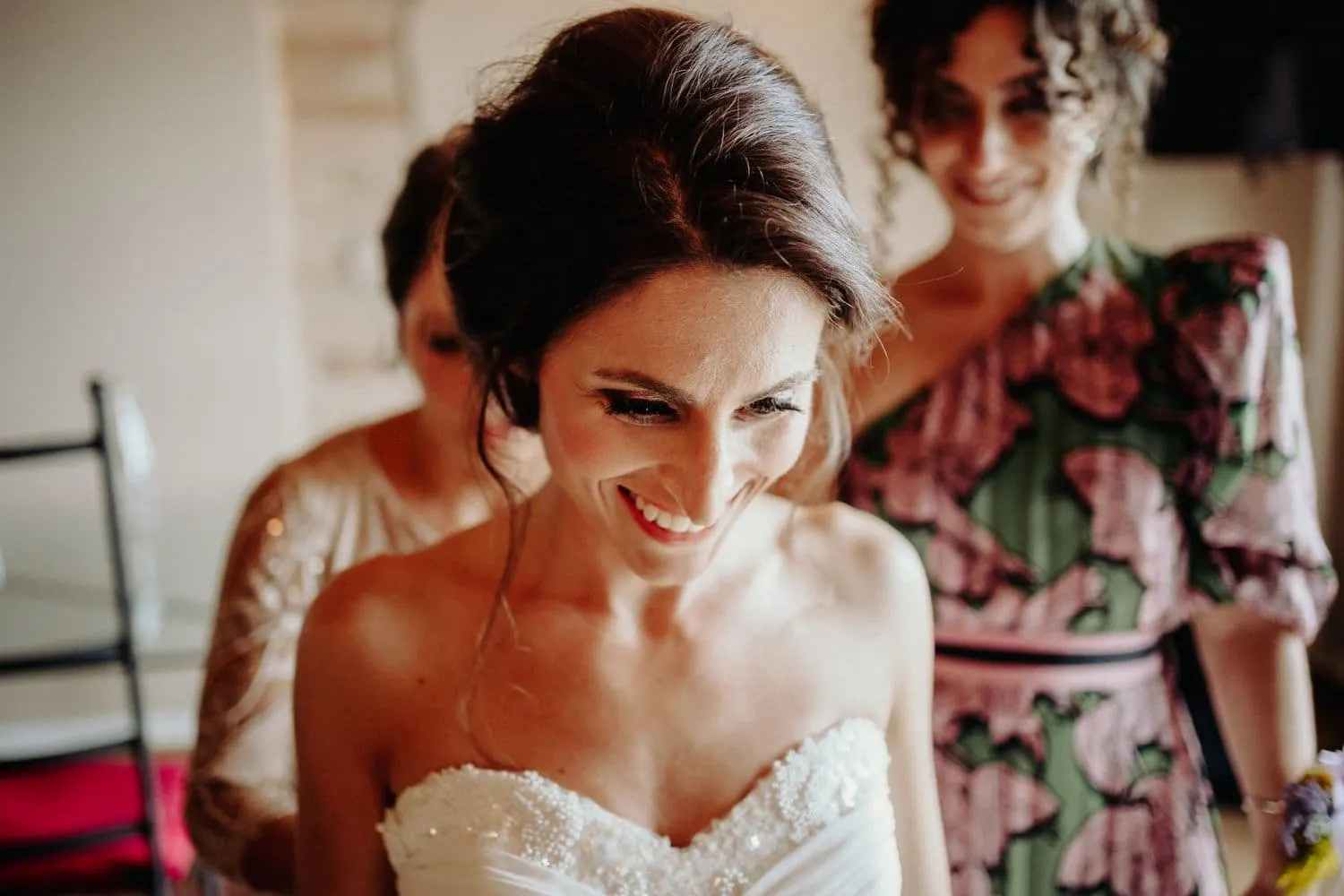 Giulia smiling as she is dressed