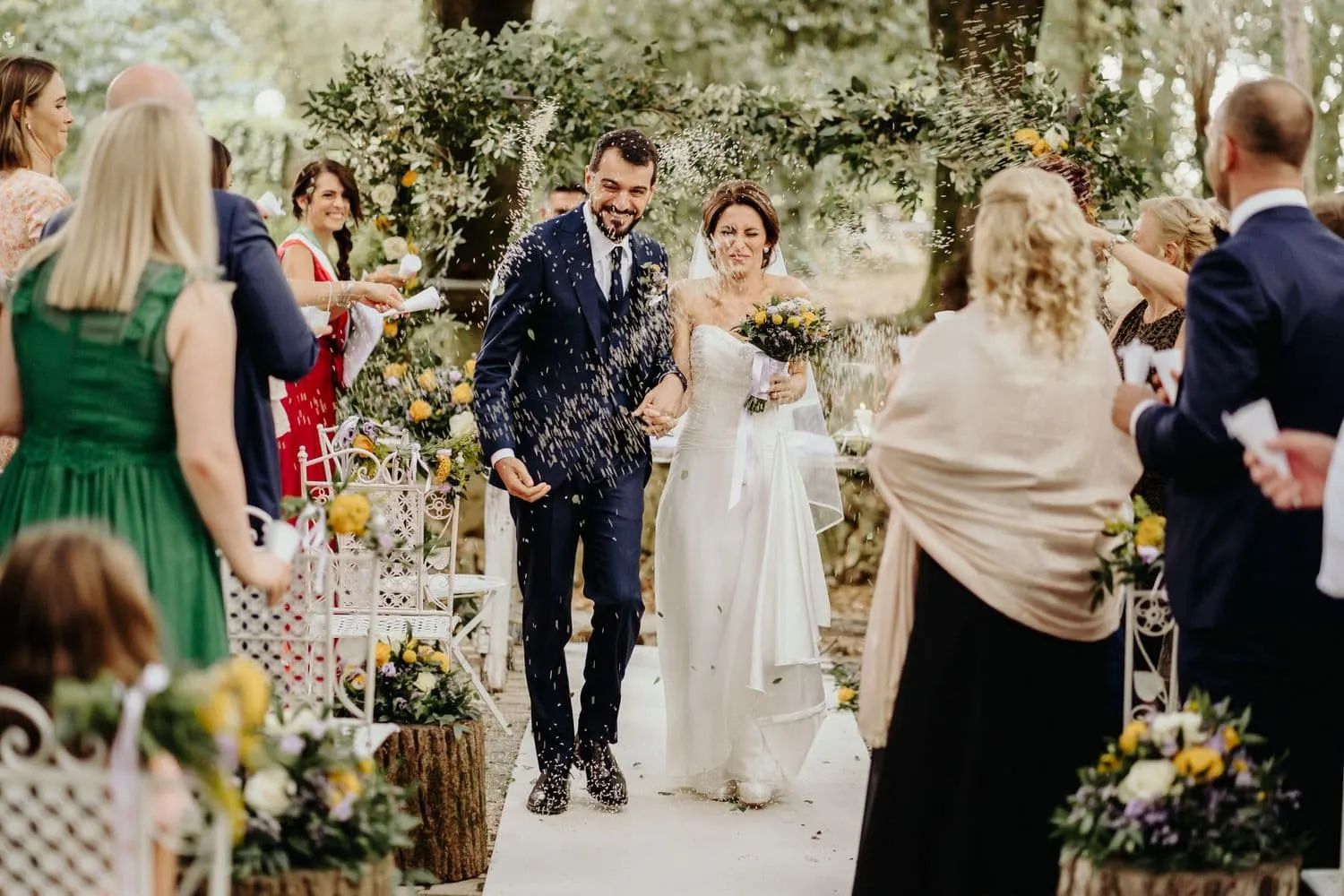 The couple's exit through thrown rice and the guests